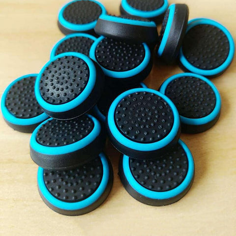 2 PAIRS OF BLUE AND BLACK/WHITE GRIPS FOR PS4 AND XBOX ONE